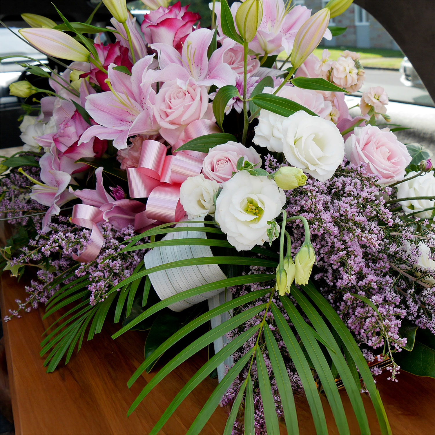 Flowers in hearse lovely tribute